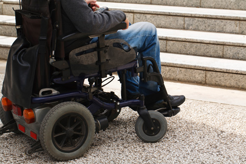 Wheelchair in front of stairs